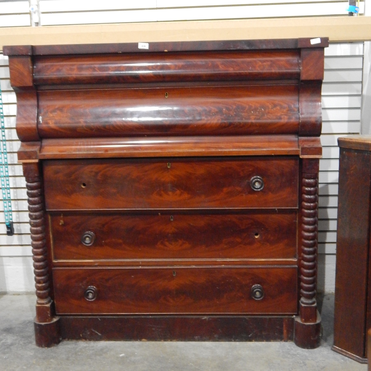 Victorian mahogany veneered chest of two cushion moulded drawers over three long drawers,