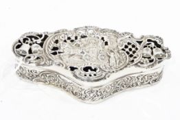 Edwardian silver box by William Comyns, London 1908, of shaped form,