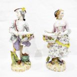 Pair of continental porcelain figures of a lady and gentleman,