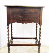 Edwardian stripped walnut shaped-rectangular occasional table and a circa 1930's oak workbox on