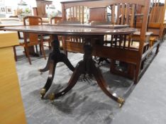 Georgian style mahogany twin pedestal dining table, with reeded edge top,