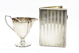 Silver cigarette case of engine turned rectangular form, Birmingham 1943 and a silver cream jug,