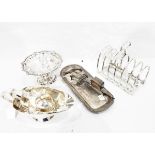 Pair of silver-plated candle snuffers and tray, a large silver plated six division toast rack,