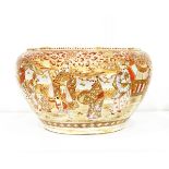 Japanese Satsuma earthenware jardiniere, ovoid with shaped panels of figures in interior,