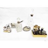 Square cut glass inkwell with silver plated collar, a silver plated cruet set,