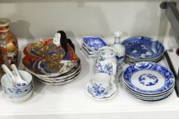 Quantity of principally Japanese porcelain plates, dishes, vase, teapot, etc.