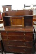 20th century mahogany chest with open shelved back and cupboard,