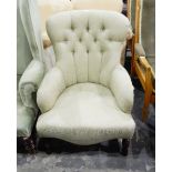 Button upholstered bedroom chair on turned supports,