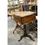 Victorian walnut work table, with serpentine shaped top, two frieze drawers below,