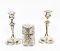 Pair of silver dressing table candlesticks, Birmingham 1923, of knopped baluster form,