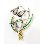 Enamel, diamond and emerald flower brooch, having three snowdrop style flowers,