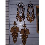 NEW LOT: Two pairs of reproduction gilt mirror wall sconces, one pair modelled as lyres,
