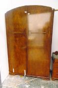 Mid 20th century figured walnut veneered two-door wardrobe and a well-type dressing table en-suite