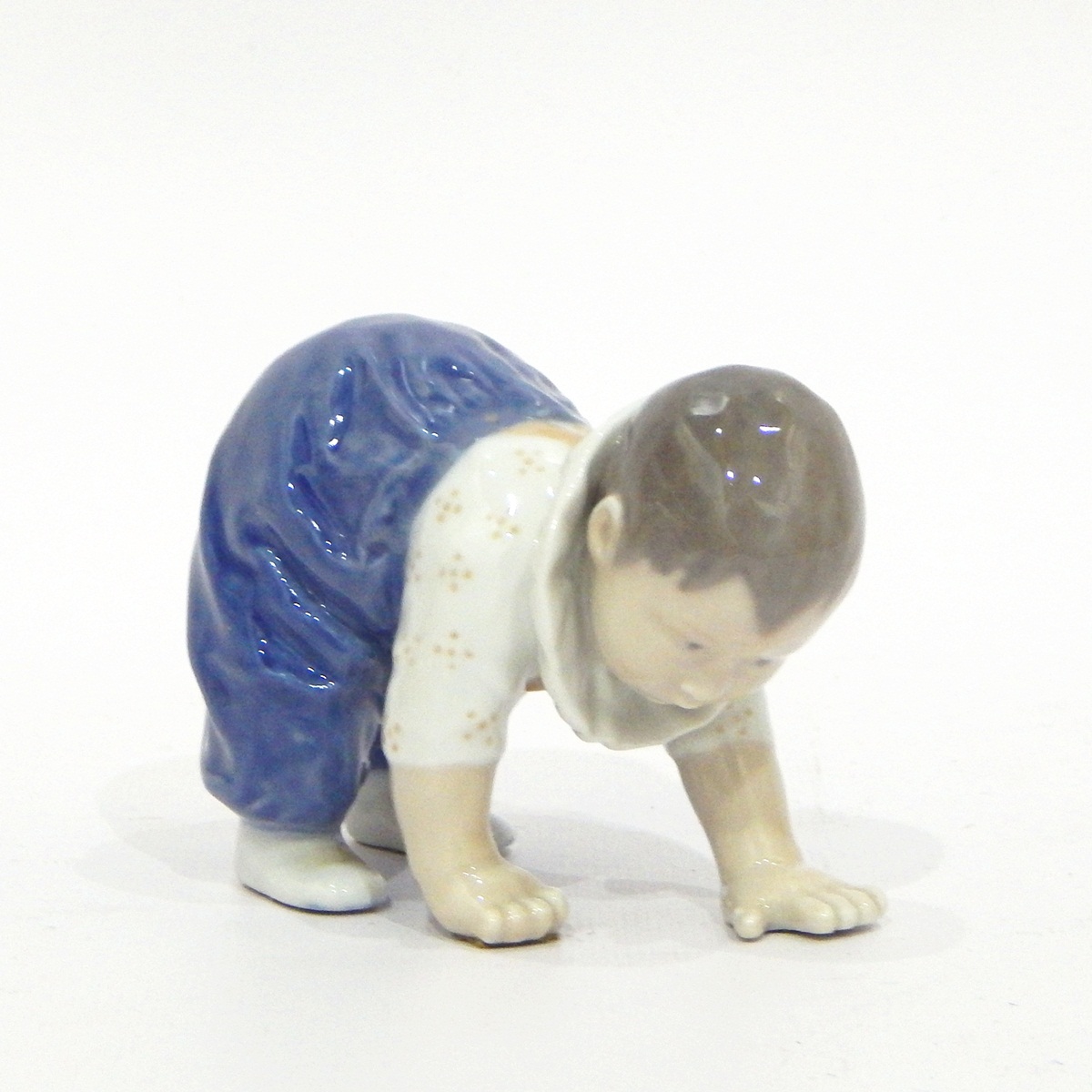 Royal Copenhagen porcelain figure group of children with puppy together with another of a crawling - Image 2 of 2