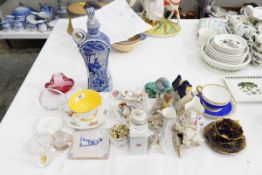 Delft blue and white gin bottle and stopper together with various decorative figurines and