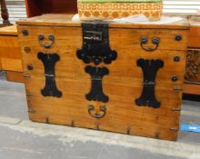 Oriental travelling trunk with drop handles,
