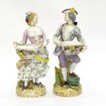 Pair of continental porcelain figures of a lady and gentleman,