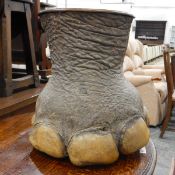 Taxidermy elephant foot that has been turned into an umbrella stand