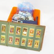 Players cigarette card album and contents including series of roses, classical gods, flags, etc.