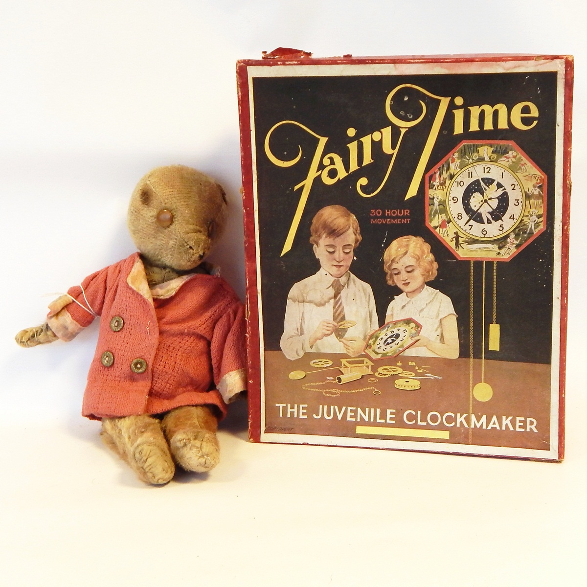 Old small plush bodied teddy bear, 26cm and a home made clock set,