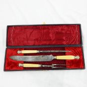 Three-piece steel carving set with ivory handles and white metal mounts,