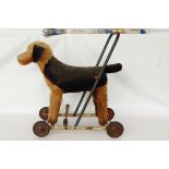 Plush bodied push-along dog (worn)