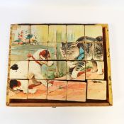Early 20th century printed bricks puzzle set with accompanying prints