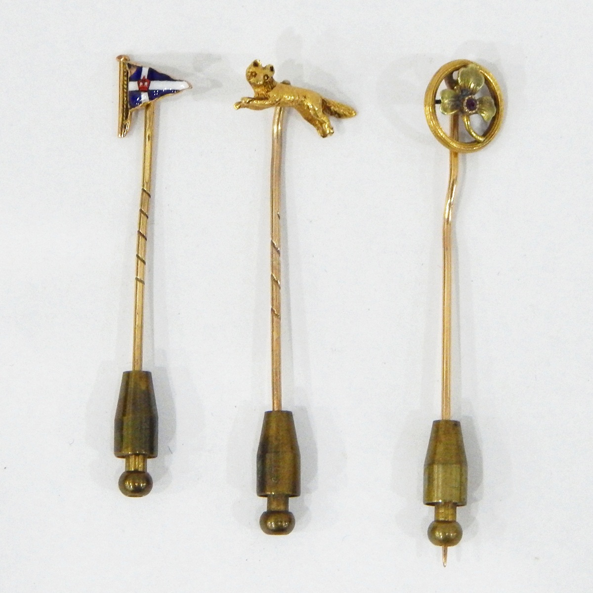 9ct gold stickpin with enamelled naval flag,