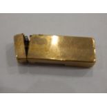 9ct gold Dunhill lighter of engine turned rectangular form