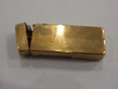 9ct gold Dunhill lighter of engine turned rectangular form