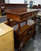Edwardian mahogany buffet having carved raised back over two frieze drawers with oxidised copper