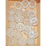 Large quantity of moulded glass pudding bowls,