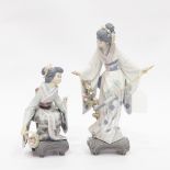 Lladro porcelain figure of a Japanese girl standing with parasol by flowering tree branch,