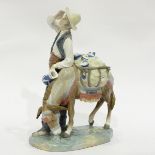 Lladro figure of a pottery seller with his donkey