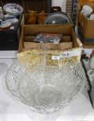 Moulded glass punchbowl and another with a boxed set of matching punch glasses