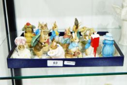 The World of Beatrix Potter, group of miniature figurines to include Lady Mouse, Peter Rabbit, etc.