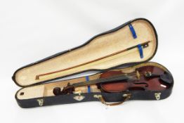 Cased French violin, one piece back, with internal label 'Medio-Fino' with bow,