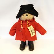 Paddington Bear with long mohair type fur, typical black hat, red felt jacket and black wellingtons,