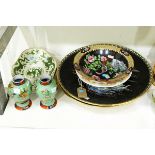 Pair of 19th century dishes of lobed oval form, decorated with dragons in green enamel,