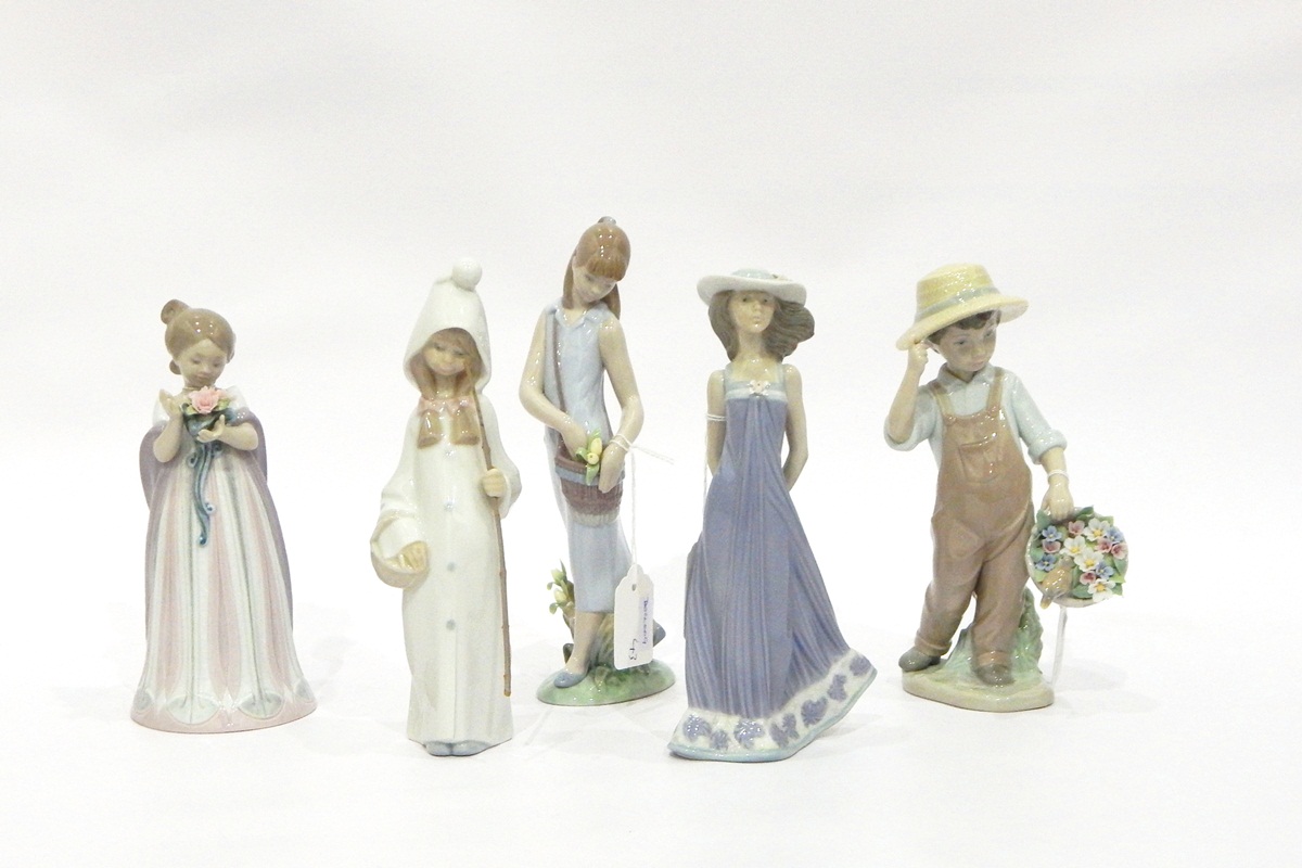 Group of five Lladro porcelain children figures to include flower gatherers, etc.