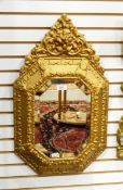 Early Georgian style gilt wall mirror, rectangular with canted corners and having floral surmount,