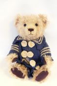 Steiff reproduction growling bear with mohair body, purple glass eyes, sewn mouth and nose,