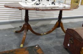 Georgian style figured walnut twin pedestal dining table,
