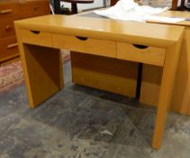 Alexander Miles Furniture Company oak dressing table, with three frieze drawers on stile supports,