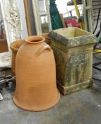 Stone chimneypot converted to a flowerpot, two terracotta planters,