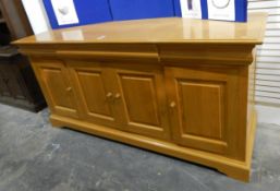 Modern pale chestnut sideboard by Simon Knowles, with three cushion frieze drawers,