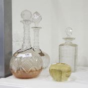 Three various late 19th/early 20th century cut glass decanters,