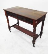 Edwardian walnut washstand fitted two frieze drawers and with under-tier, on turned supports,