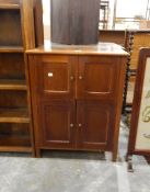 Eastern hardwood side cabinet with a lift-up top and cupboard enclosed by four framed panelled