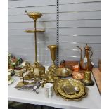 Large quantity of brassware including chambersticks, candlesticks, door stop,